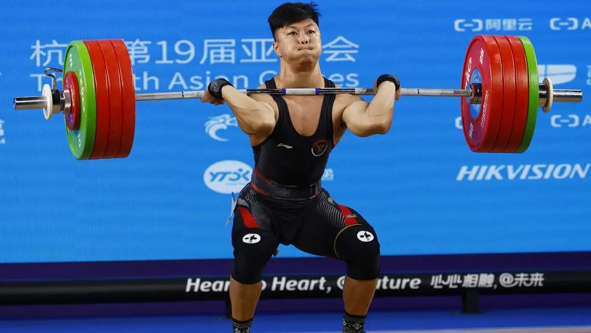 Rahmat Erwin Abdullah: Raja Clean and Jerk yang Tak Terhentikan